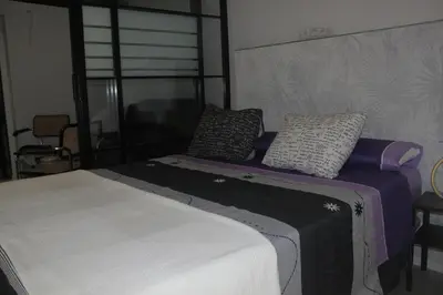 Cama o camas de una habitación en Madrid villa suites Rústico