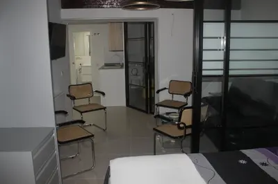 Zona de estar de Madrid villa suites Rústico