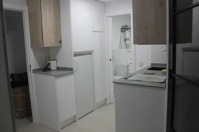 Una cocina o zona de cocina en Madrid villa suites Rústico