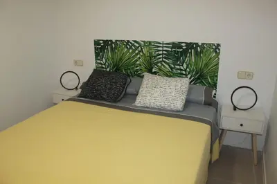 Cama o camas de una habitación en Madrid villa suites Rústico