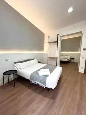 Cama o camas de una habitación en H21 Rooms