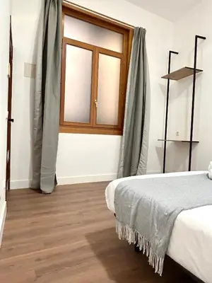 Cama o camas de una habitación en H21 Rooms