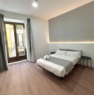 Cama o camas de una habitación en H21 Rooms