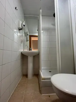 Un baño de H21 Rooms