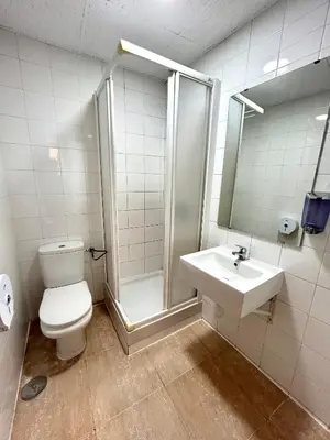 Un baño de H21 Rooms