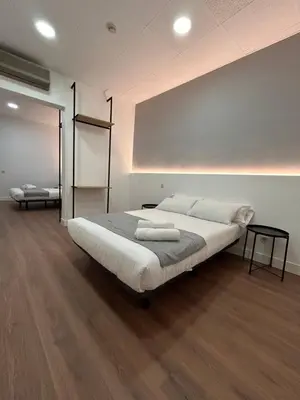 Cama o camas de una habitación en H21 Rooms