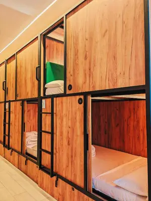 Cama o camas de una habitación en Urban Inn Capsule Madrid