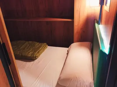 Cama o camas de una habitación en Urban Inn Capsule Madrid