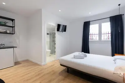 Cama o camas de una habitación en Hotelito Boutique Madrid Puente Vallecas