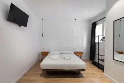 Cama o camas de una habitación en Hotelito Boutique Madrid Puente Vallecas