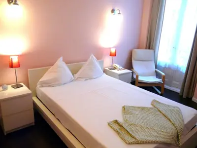 Cama o camas de una habitación en Hostal Goyal Pizarro