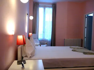 Cama o camas de una habitación en Hostal Goyal Pizarro