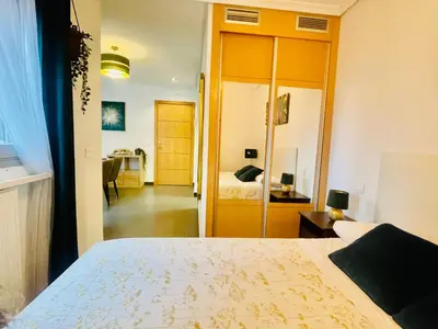 Cama o camas de una habitación en ATICO CON TERRAZA - cerca a MADRID RIO