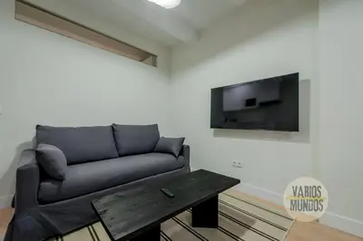 Una televisión o centro de entretenimiento en Nuevo y Céntrico Apt 7px en plena Plaza del Carmen E2