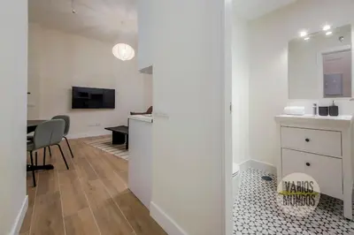 Una televisión o centro de entretenimiento en Cozy y Céntrico Apt para 6pax en Plaza del Carmen E2