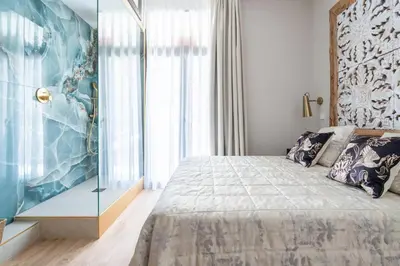 Cama o camas de una habitación en City Deluxe Reina Sofia Atocha comfy apartment
