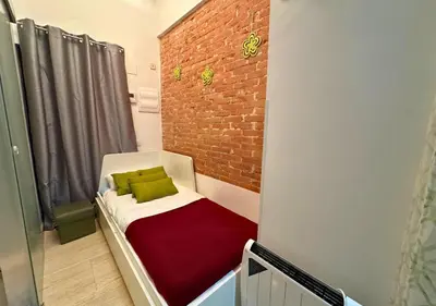 Cama o camas de una habitación en Studio Relatores