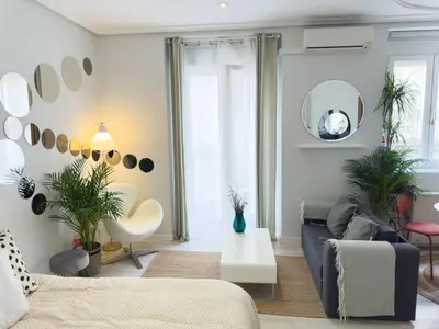 Zona de estar de DISFRUTA del Barrio de las Letras Tu segundo hogar en Madrid