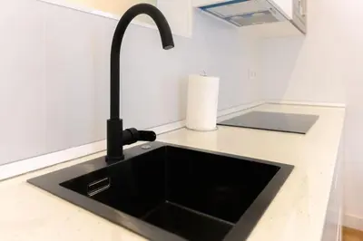 Una cocina o zona de cocina en For You Rentals temporal Elegancia y Confort en el centro de madrid FEI70