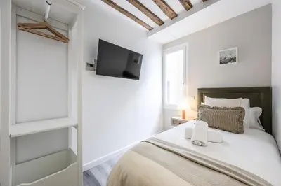 Cama o camas de una habitación en Arteria Madrid Gran Vía