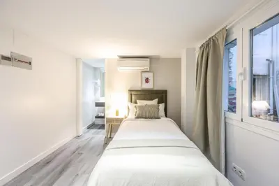 Cama o camas de una habitación en Arteria Madrid Gran Vía
