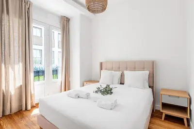 Cama o camas de una habitación en Sol Apartments - En el centro de Madrid