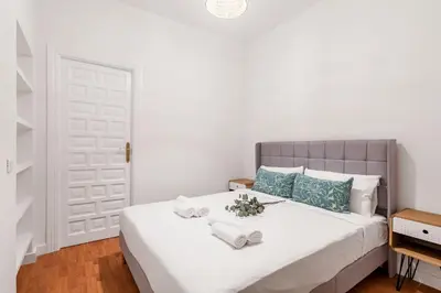 Cama o camas de una habitación en Sol Apartments - En el centro de Madrid