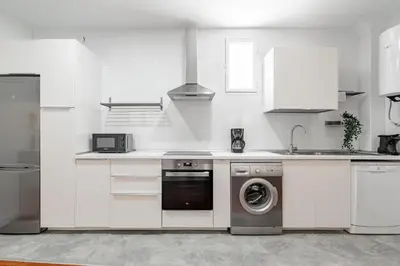 Una cocina o zona de cocina en Sol Apartments - En el centro de Madrid