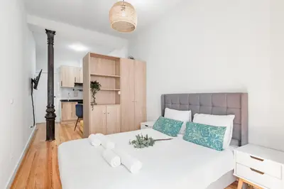 Cama o camas de una habitación en Sol Apartments - En el centro de Madrid