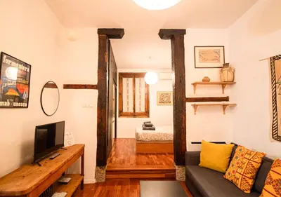 Una televisión o centro de entretenimiento en Apartamento Almendro