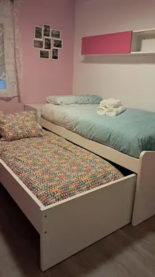 Cama o camas de una habitación en Piso a dos minutos del metro