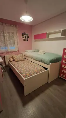 Cama o camas de una habitación en Piso a dos minutos del metro