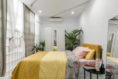 Cama o camas de una habitación en Casa Sana Corazón - Barrio Salamanca