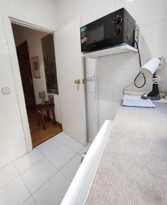 Una televisión o centro de entretenimiento en Apartamento