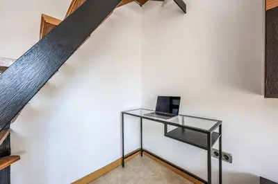 Una televisión o centro de entretenimiento en Atico-dúplex con dormitorio y terraza, Goya