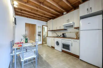 Una cocina o zona de cocina en Atico-dúplex con dormitorio y terraza, Goya