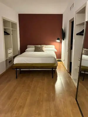 Cama o camas de una habitación en AparthotelTribunal