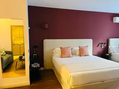 Cama o camas de una habitación en AparthotelTribunal