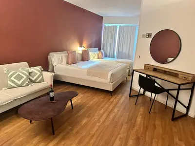 Cama o camas de una habitación en AparthotelTribunal