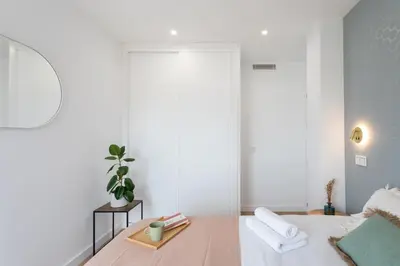 Cama o camas de una habitación en LAGUNARIA - Apartamento con Despacho en Retiro, Madrid