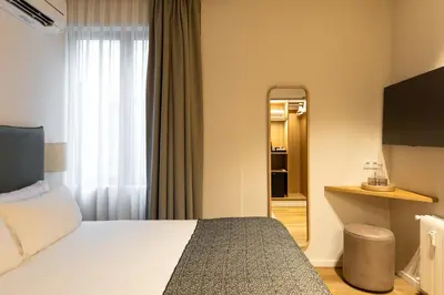 Cama o camas de una habitación en Colectia Stays Gran Vía