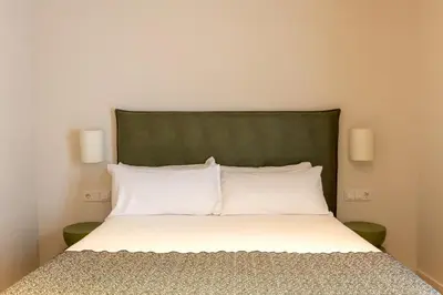 Cama o camas de una habitación en Colectia Stays Gran Vía