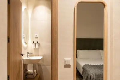 Cama o camas de una habitación en Colectia Stays Gran Vía