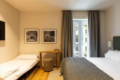 Cama o camas de una habitación en Colectia Stays Gran Vía