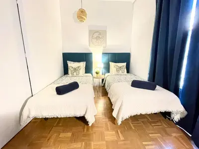 Cama o camas de una habitación en Centric Rooms Madera Gran Via