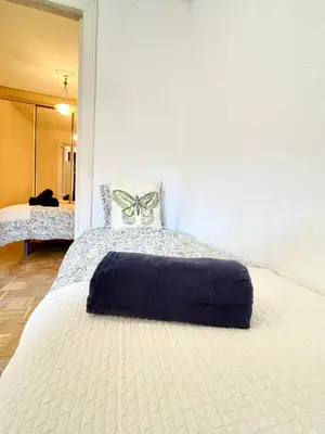 Cama o camas de una habitación en Centric Rooms Madera Gran Via