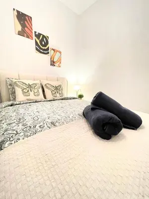 Cama o camas de una habitación en Centric Rooms Madera Gran Via