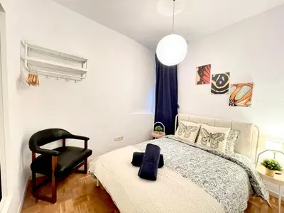 Cama o camas de una habitación en Centric Rooms Madera Gran Via