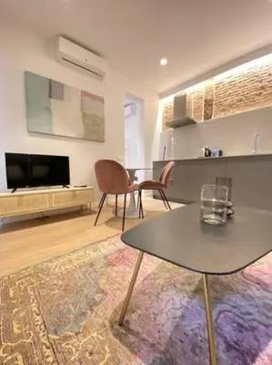 Zona de estar de Suites La Latiina - Madrid Centro