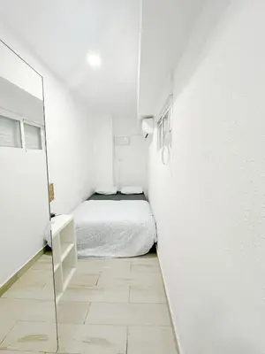 Cama o camas de una habitación en GZ20 Estudio Chamberi Madrid Centro AC WIFI